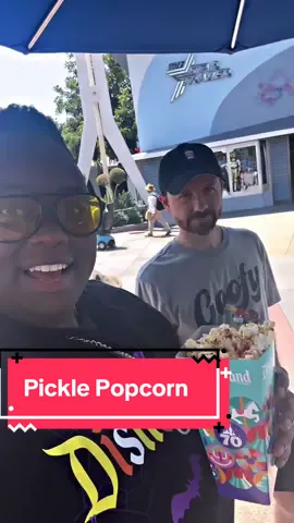 Spicy Pickle Popcorn at Disneyland is so bomb. It’s Spicy, buttery, cheesy and the perfect Sharable snack.  Would you try it?  @Disney Parks  #disneysnacks #disneyfood #distok #disneylandhalloween #disneyland 