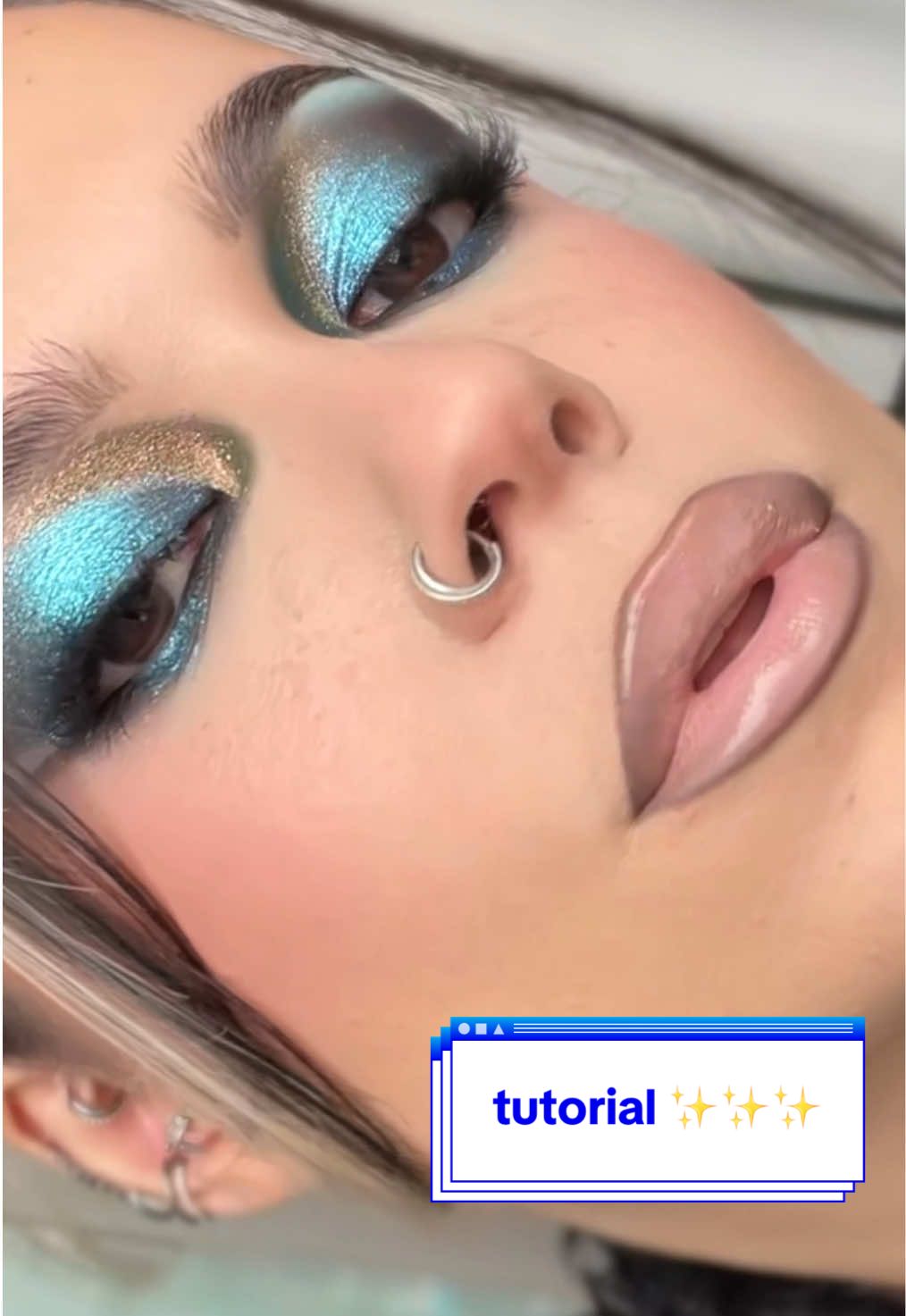 Replying to @chiaraferreiira muito brilho e duochrome pra beauty fair esse ano ✨ _produtos: @BM Beauty Brasil brow stay  @maccosmetics prep + prime @Girlcult Official paleta “59 batik” @Priscilla Lessa angel eyeliner MAC hyper real serumizer  @wetnwildbeauty lip oil “crystal ball” @Linha NiinaSecrets corretivo perfect match “0” @Estée Lauder base double wear “1W0” @Rare Beauty soft pinch liquid contour “gentle” @Diorbeauty blush rosy glow “063 pink lilac” @Guerlain bronzer terracota “00” @diorbeauty dior backstage “001 universal” @YSL Beauty pó all hours hyper blur “translucent”