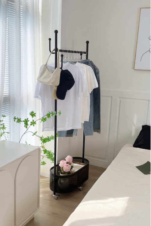 This coat rack saved me from the bad habit of putting clothes in a mess, and my room will never be messy again. #coatrack#rotatingrack#homegoods #bedroomrenovation#cornerstorage