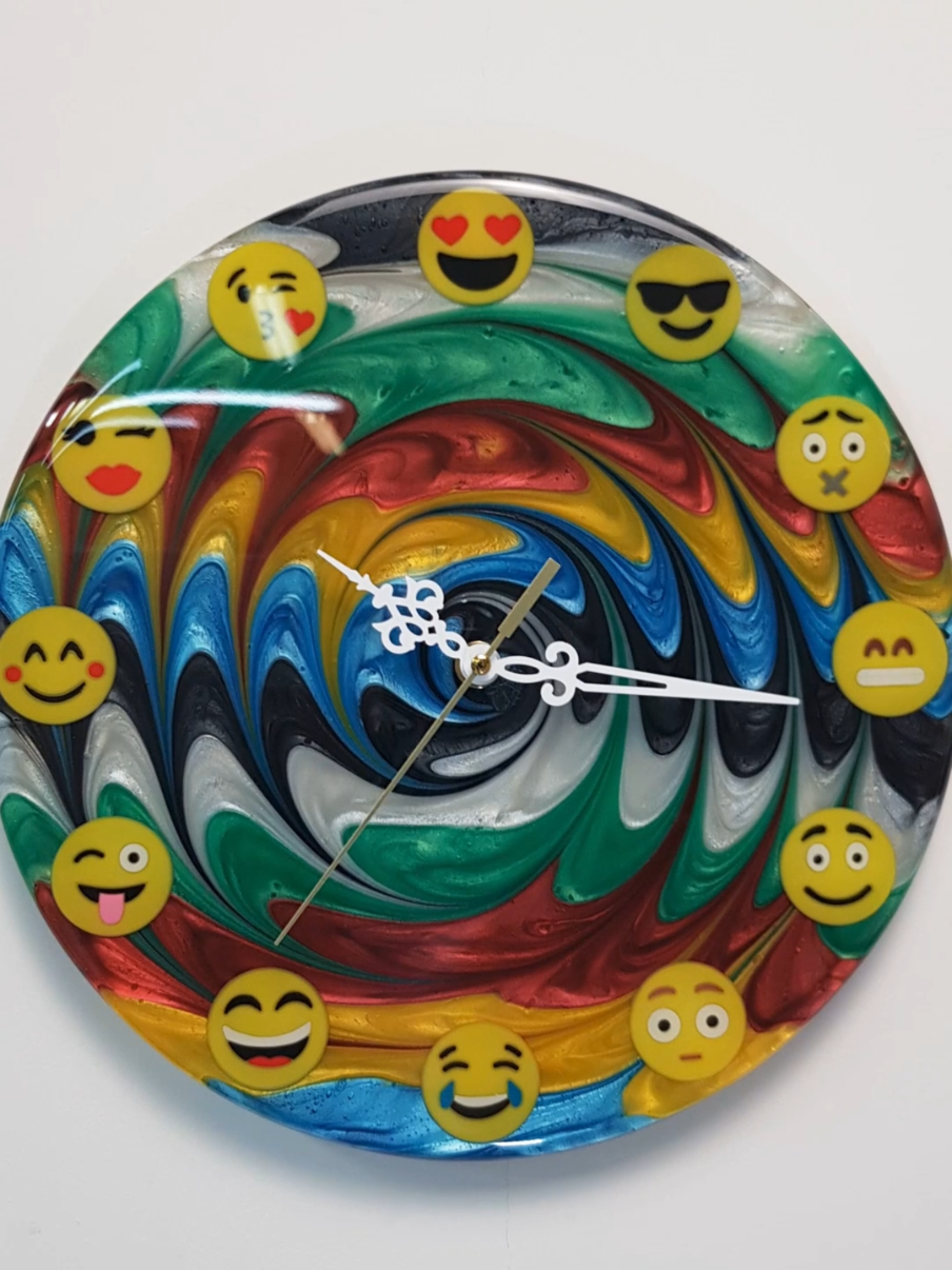 This is not just a clock – it’s part of a limited edition series where each hour is marked by a different emoji emotion. A swirl of color. A burst of feeling. Handcrafted in Italy using my unique resin technique.  Each clock in this series is completely unique – no two are alike. The colors are impossible to replicate, just like our emotions.  🔧 Material: Epoxy resin 📏 Diameter: 30 cm 🔢 Limited Edition: Only 10 pieces worldwide ✅ Each piece is numbered and comes with a Certificate of Authenticity 📍 Handmade from scratch – poured, polished, and finished by me  Check availability – link in bio  #resinclock #epoxyresinart #emojiart #fxpart  #handmadeclock 
