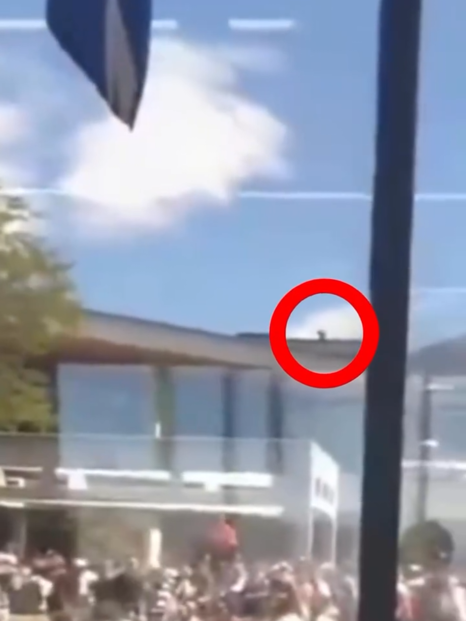A video circulating online appears to show the suspected gunman positioned on a rooftop overlooking the area where conservative commentator Charlie Kirk was speaking at Utah Valley University, just moments before the shooting occurred. #charliekirk #utah #breakingnews 