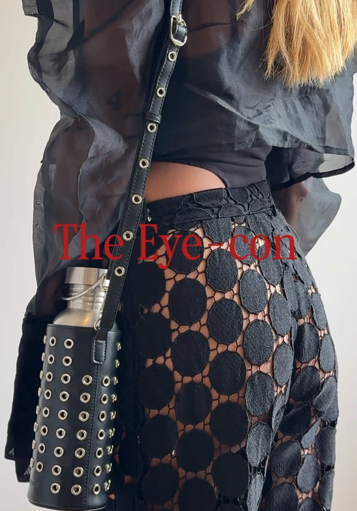 The Eye-con, reimagined three ways. An exercise in versatility, attitude, and unapologetic styling. Jacket – @HEYAMI  Bodysuit – @TOPSHOP TOPMAN  Trousers – designed by the team at Solace London Loafers – @Prada  Bottle Bag – @ott.af 🖤 More than an accessory - The Eye-con is armour. Styled to disrupt, designed to command. #OTTaf #bottlebags #OOTD #statementstyle #dancefloorfashion    