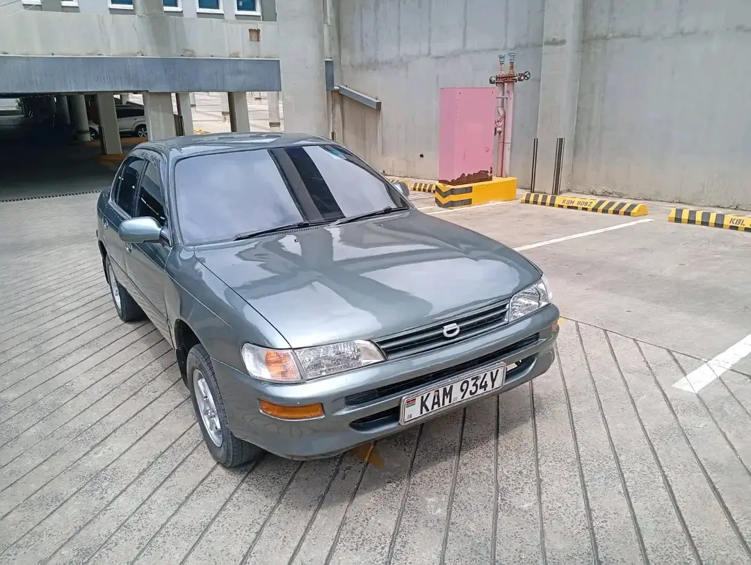 TOYOTA COROLLA 100 1490CC PETROL MANUAL TRANSMISSION 5A ENGINE 5 SPEED ALLOY RIMS NEW TYRES AFTERMARKET RADIO NEAT FABRIC INTERIOR ACCIDENT FREE ORIGINAL ENGINE AND GEARBOX READY DOCUMENTS ASKING PRICE 200,000KSH FINANCING OPTION AVAILABLE DEPOSIT KSH 50,000 TWO MONTHS GRACE PERIOD MONTHLY PAYMENT FROM AS LOW AS 10,000KSH REACH OUT ON 0734576828 OR 0716619706 FOR MORE INFO. 