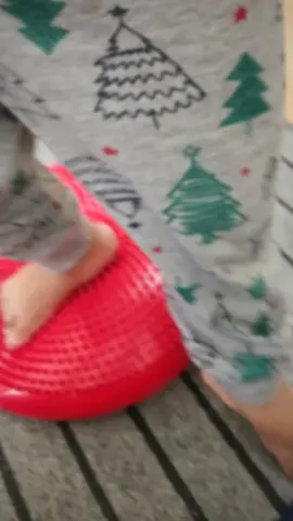 Here are 5 ways to use a wobble/balance cushion at home with autistic children: 1. Seating Alternative for Calming and Focus - Use: Place the wobble cushion on a chair or stool for the child to sit on. - Benefit: The gentle instability can provide sensory input, help with calmness, and sometimes aid focus. Some autistic children find movement or sensory feedback calming. - Tips: Start with short periods, observe comfort; ensure safety with supervision. 2. Sensory Play and Movement Breaks - Use: Let the child play on the wobble cushion on the floor – bouncing, rocking, trying to balance. - Benefit: Provides vestibular (balance/movement) sensory input which can be regulating for some autistic children. - Tips: Encourage playful movements like gentle bouncing or controlled rocking. 3. Core Strength and Motor Skills Development - Use: Have the child sit or kneel on the cushion and do activities like reaching for toys, drawing, or playing games requiring balance. - Benefit: Engaging on a wobble cushion can help develop core strength and balance skills. - Tips: Supervise for safety; make it a fun challenge with games. 4. Transition Tool for Regulation - Use: Incorporate the cushion into transition times (like moving from play to mealtime) as a brief sensory strategy. - Benefit: Can help autistic children regulate sensory needs briefly before shifting activities. - Tips: Pair with other sensory strategies if helpful for the child. 5. Sensory Diet Component - Use: Include the wobble cushion as part of a personalised sensory diet – a set of sensory strategies tailored for the child’s needs. - Benefit: Can be one of many tools meeting sensory needs for regulation. - Tips: Work with occupational therapists (OTs) for personalised sensory strategies if possible. Considerations - Individual Differences: Autistic children have unique sensory profiles; observe what works for the child. - Safety:  Ensure the child is supervised; cushions vary – pick one suitable for your child's needs.  P:s; You can order this from @preloved_byheebal at a very reasonable price, also from @unaistoys and use the code of Abdullah and get 5% discount inshaAllah  #autism #autismacceptance  #Fyp #Foryou 