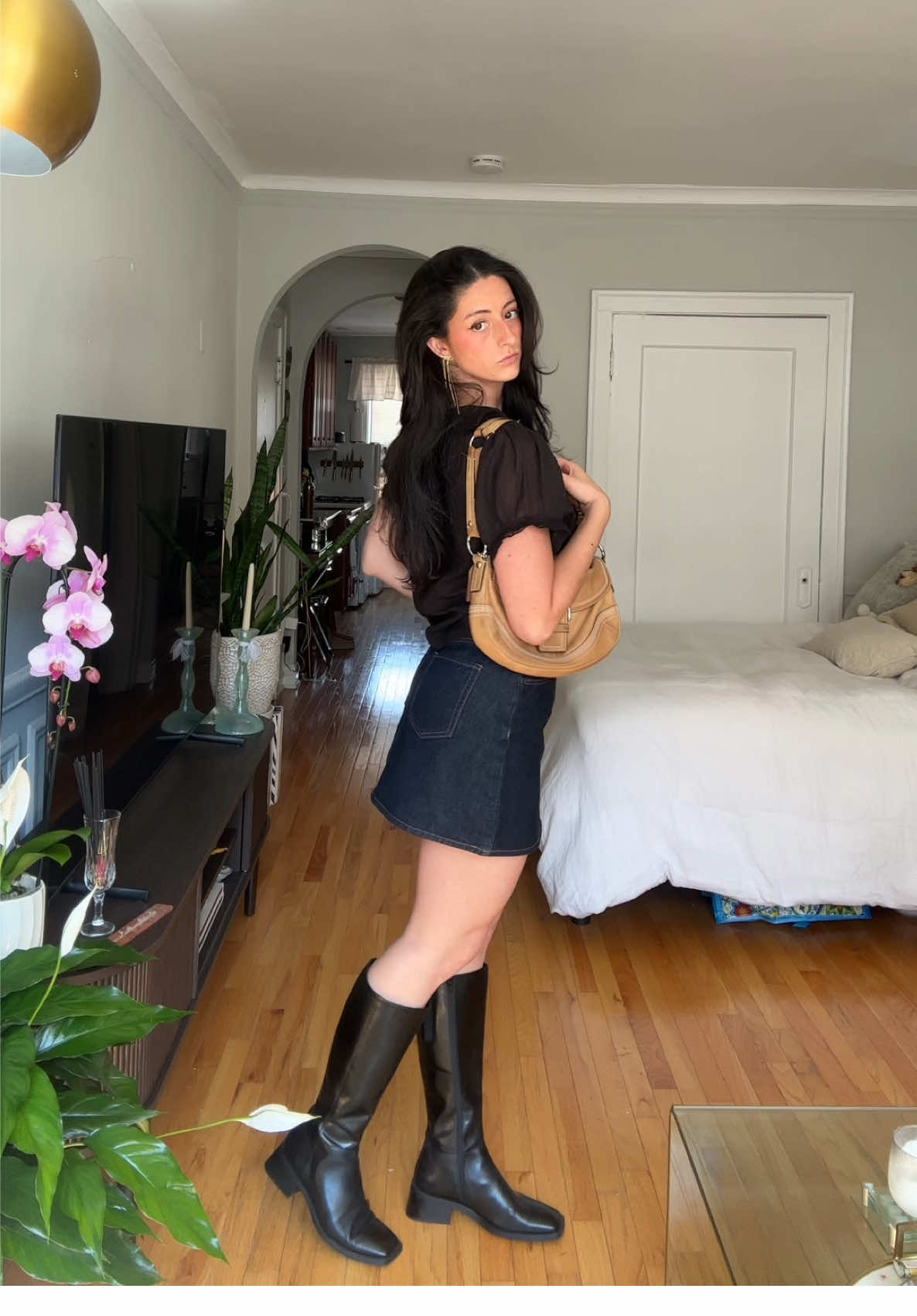 Top: Cupcakes and Cashmere Skirt @Old Navy Official  Boots @Vagabond Shoemakers  Purse @Coach  Belt: thrifted  Earrings @Amazon @Amazon Influencer Program  #OOTD #chicago #chicagoinfluencer 