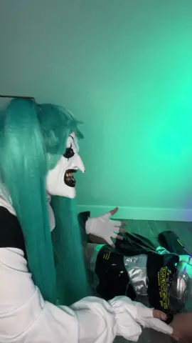 She's sleeping shhhhh 🤫 • Sleeping miku: @💕Pixelbunnie02💕  #arttheclown #hatsunemiku #arttheclowncosplay #hatsunemikucosplay #terrifier #BookTok #masktok #horrorcosplay #horrortok #hhn #halloweenhorrornights #clowncosplay #clownmakeup 