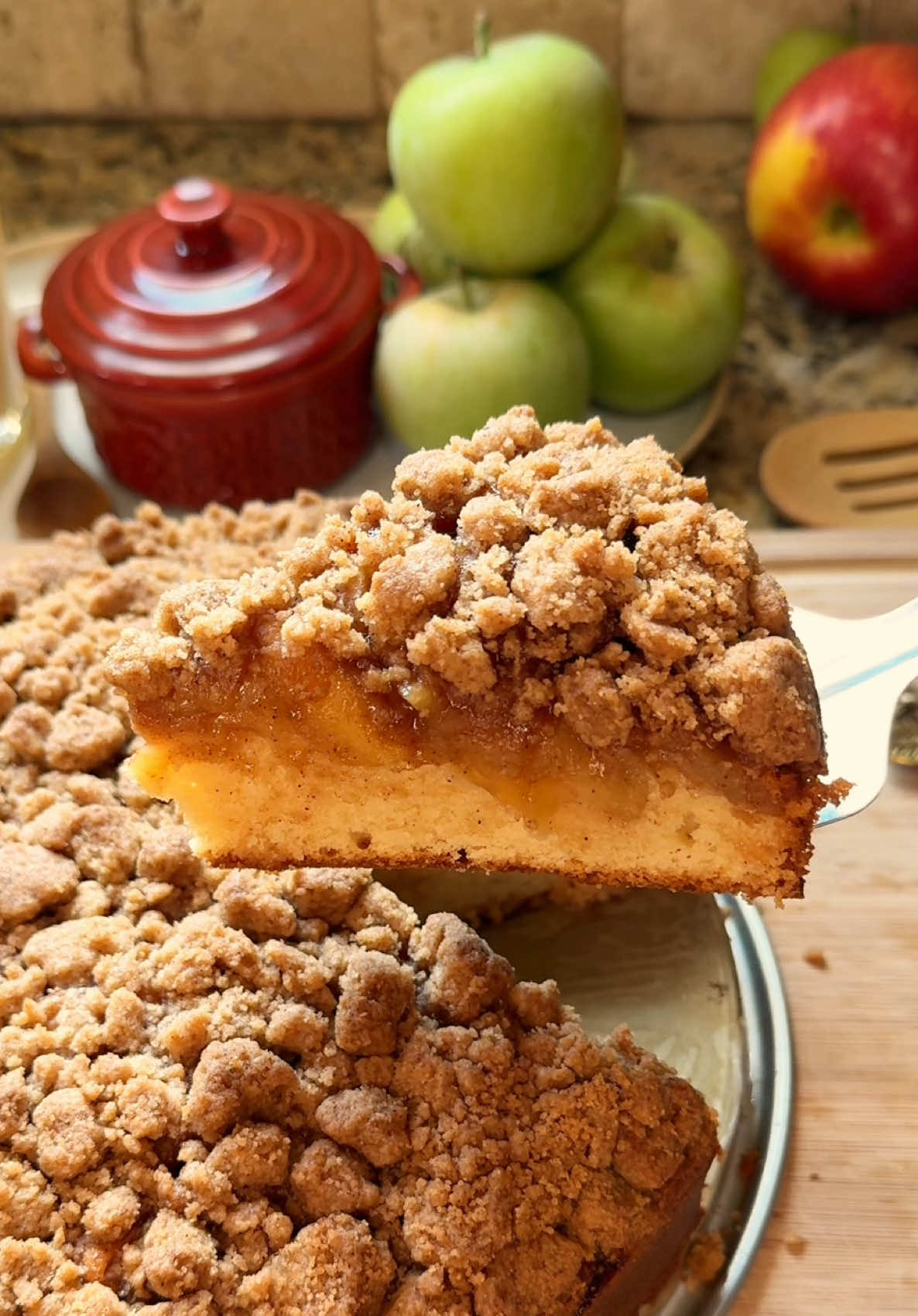 Apple crumb cake🍂🍏🍰                                               Recipe:                                                                 Ingredients Crumble Topping -6 Tbsp unsalted butter, cold and diced (85g) -1 cup all-purpose flour (120g) -3/4 cup light brown sugar, packed (160g) -2 tsp cinnamon -pinch of salt Apple Filling -4 Granny Smith apples (about 4 cups/450g), peeled and sliced  -1/2 cup light brown sugar, packed (100g) -1 1/2 tsp cinnamon  -2 1/2 Tbsp water  -1 Tbsp lemon juice -4 Tbsp unsalted butter (56g)  -pinch of salt -2 tsp cornstarch mixed with 1 Tbsp water Cake -2 cups all-purpose flour (240g) -2 tsp baking powder -1/2 tsp salt -10 Tbsp unsalted butter, softened (141g) -3/4 cup granulated sugar (150g) -1/4 cup light brown sugar, packed (53g) -2 eggs, room temperature  -2 tsp vanilla -1/2 cup sour cream, room temperature (115g) -2 Tbsp milk Instructions  For the crumble: 1. Whisk together flour, light brown sugar, cinnamon, and a pinch of salt. 2. Add the cold butter and rub it into the flour mixture with your fingers until it looks crumbly with some bigger chunks. (Tip: squeeze the mixture in your hand, then break apart for larger crumbs.) 3. Chill in the fridge while you prepare the filling and cake. For the apple filling: 1. In a saucepan over medium heat, combine apples, brown sugar, cinnamon, water, lemon juice, butter, and salt. Stir until the butter melts. 2. Cover and cook for about 8-10 minutes, until the apples are softened. 3. Stir in the cornstarch mixture. Simmer 1–2 minutes, until thickened. Set aside to cool slightly. For the cake: 1. Preheat oven to 350°F. Grease a 9-inch springform pan and line the bottom with parchment paper. 2. In a medium bowl, whisk together flour, baking powder, and salt.  3. In a large bowl, beat the butter, granulated sugar, and brown sugar for 2-3 minutes, until light and fluffy. 4. Add the eggs and mix until combined. 5. Mix in vanilla and sour cream until combined. 6. Add the dry ingredients and mix until just combined. Then mix in the milk until just combined. Be careful to not over-mix. 7. Spread the batter evenly into the prepared pan. Spoon the apple filling on top, then sprinkle the crumble topping all over. 8. Bake 45-53 minutes, until a toothpick in the center comes out clean. If the top starts browning too much, cover it loosely with aluminum foil. 9. Cool at least 30 minutes. Run a knife around the edge of the pan. Slice and serve. Optional: drizzle with caramel before serving. #applecrumble #cake #fall #Recipe #baking 