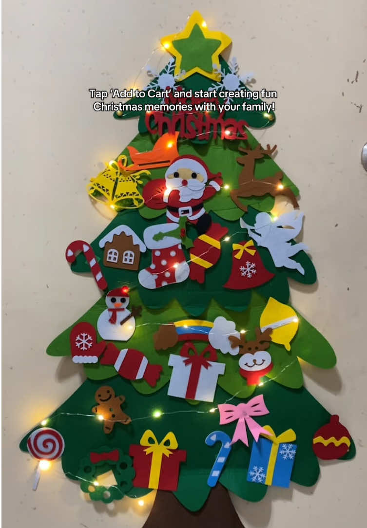 Christmas feels na! Decorating this felt paper Christmas tree with the kids—fun, safe & creative bonding time. 🎄❤️ Disclaimer: Child shown is supervised by an adult. For fun and age-appropriate purposes only.🤍✨ #christmastree #christmas #christmasdecor #christmas2025  #creatorsearchinsights 