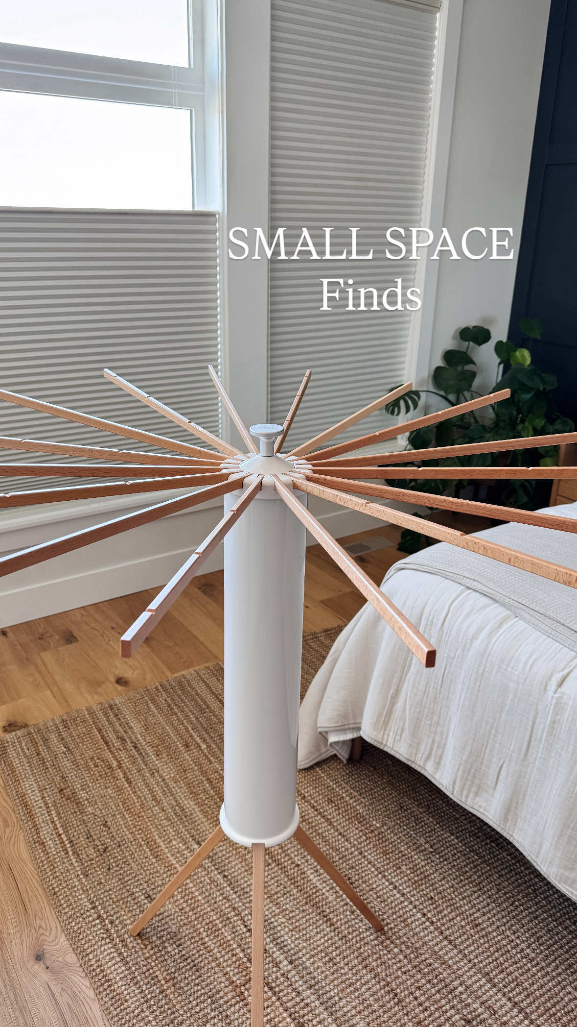 Amazon Laundry Find for Small Spaces! Linked in my Amazon Shop under LAUNDRY. Amazon Space Saving Laundry Find. This is a portable laundry rack with an easy open, space saving design. You can customize the number of arms you need, hang or drape your clothes and it can be tucked away in the corner when you are done.  #amazonhome #amazonhacks #laundryhacks #spacesaving #smallspacesolutions  