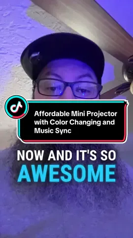 We talk about a little mini projector that is very affordable right now. It's small and can be placed anywhere. We can change the colors on it and it syncs to music, though we can't play copyrighted music. It comes with a controller and a different piece to change the design. This projector would be awesome for a living room or bedroom. #summersales #lightprojector #nightlight #coollight 