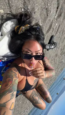 Lollipop on the beach in a tiny bikini 👌 Ohrid, North Macedonia 📍