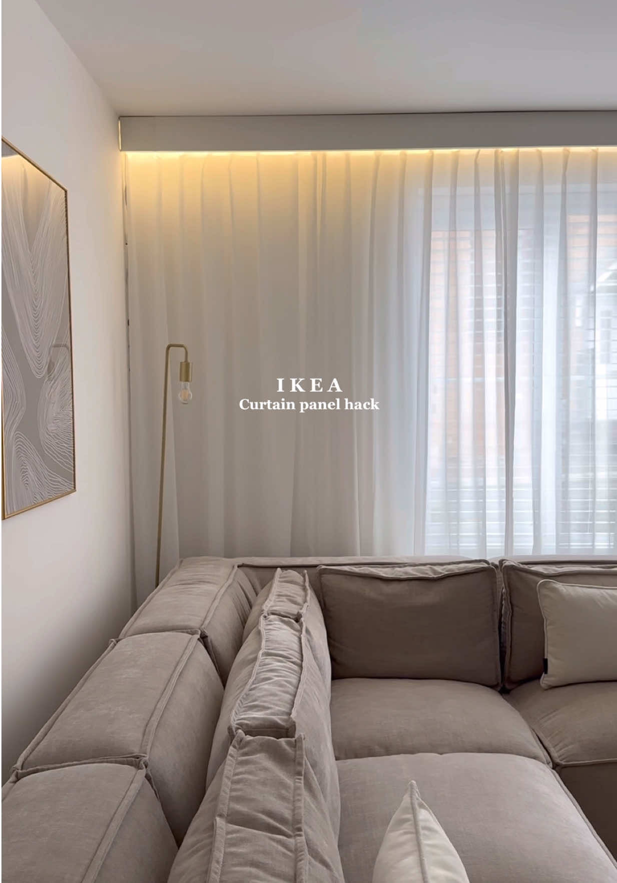 IKEA curtain panel hack ✨ Transform your room and get that luxury hotel feel using IKEA mosslanda shelves!  All you need is: - ‘MOSSLANDA’ pictures shelf’s (I used 3 large and 1 small shelf) - product code 902.921. - LED strip lights - these are from @therangeuk as they were cheaper here but IKEA also sell them  - Decorators caulk to fill in the fine gaps between each panel  #ikeahack #ikeaideas #ledlight #homedecor #fyp 
