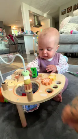 Our favorite activity table! she will take things in and out of this basket forever #baby #activitytable #busyboard #montessori #fyp 