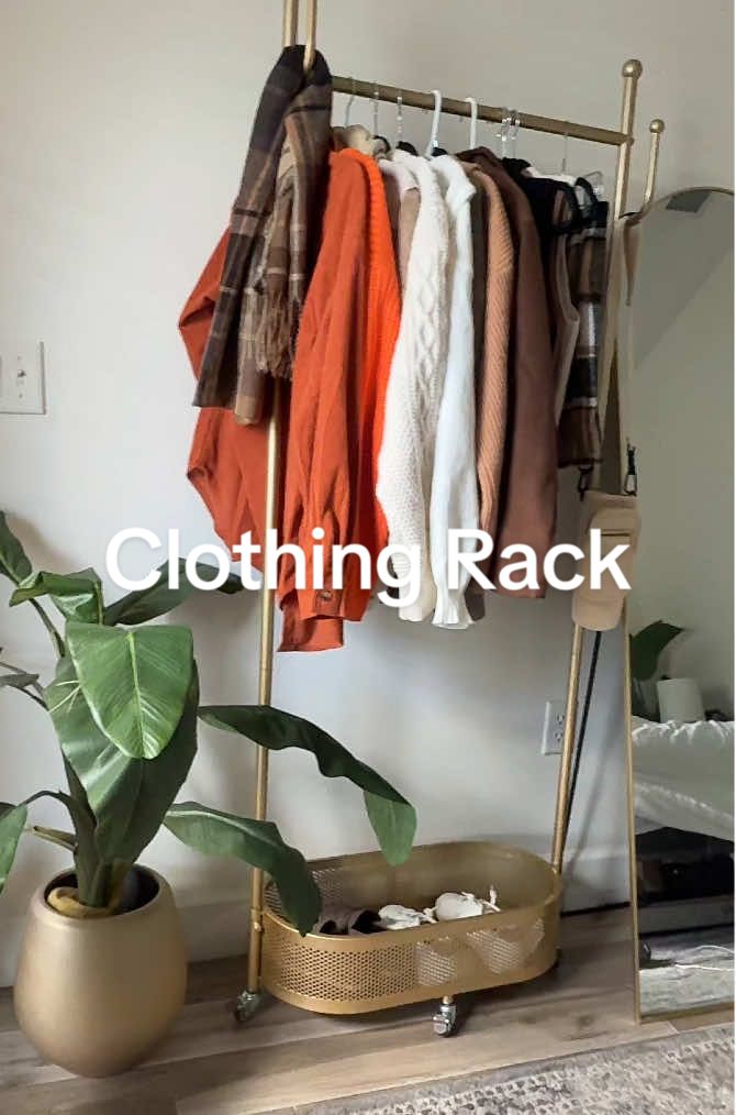 This rolling coat rack is perfect for extra closet space, seasonal clothing organization, a guest bedroom, laying out your clothes the night before, and anywhere you need extra clothing space. @OAI Iron Art Home #coatrack#closet#storage#cozyhome #tiktokmademebuyit 