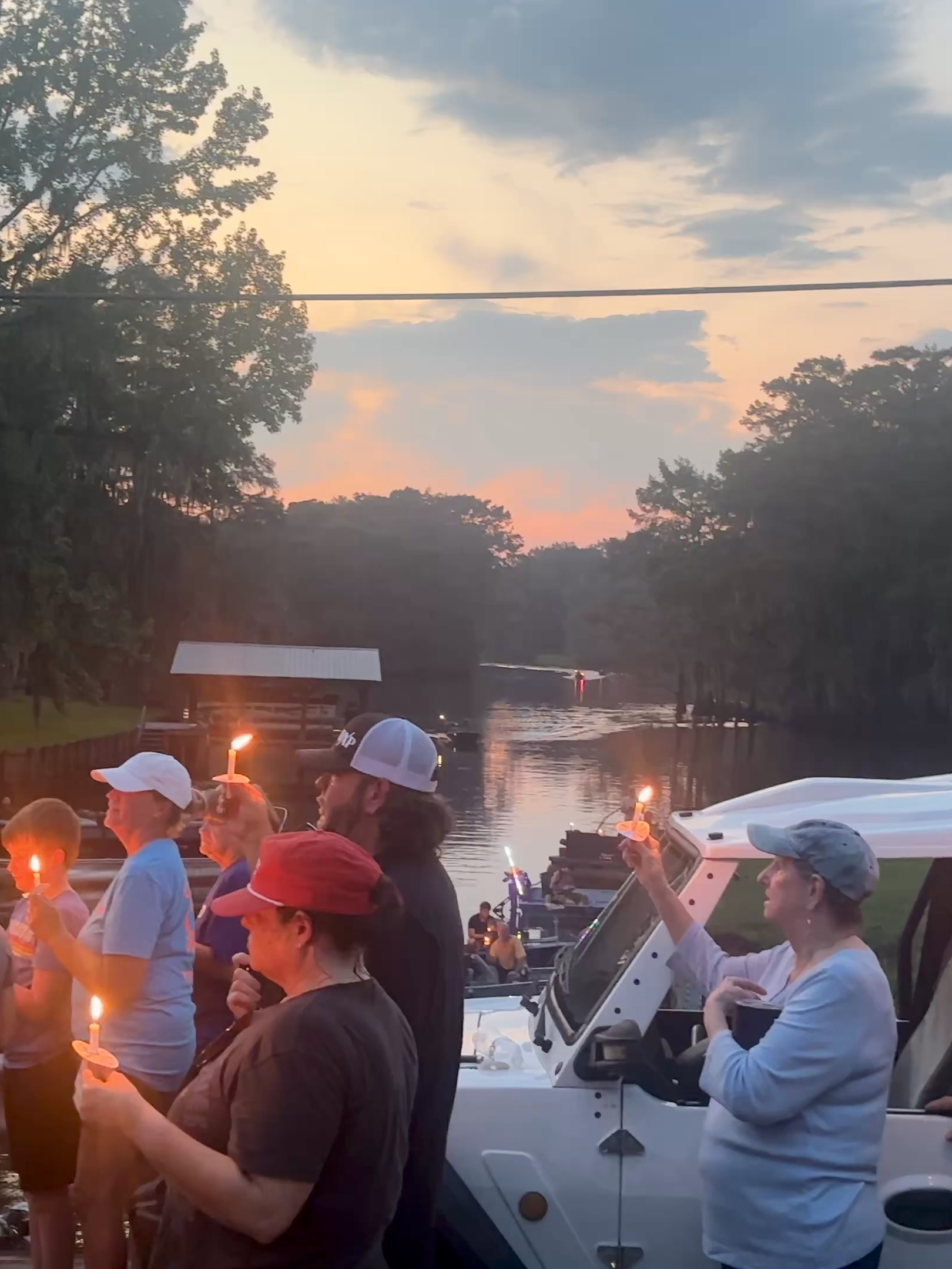 A candlelight vigil was held for Charlie Kirk on the Texas side of Caddo Lake Saturday night. (courtesy: Mike Mangham and Mark Mangham of Twin Blends Photography) #charliekirk #rip #texas #turningpoint #fyp