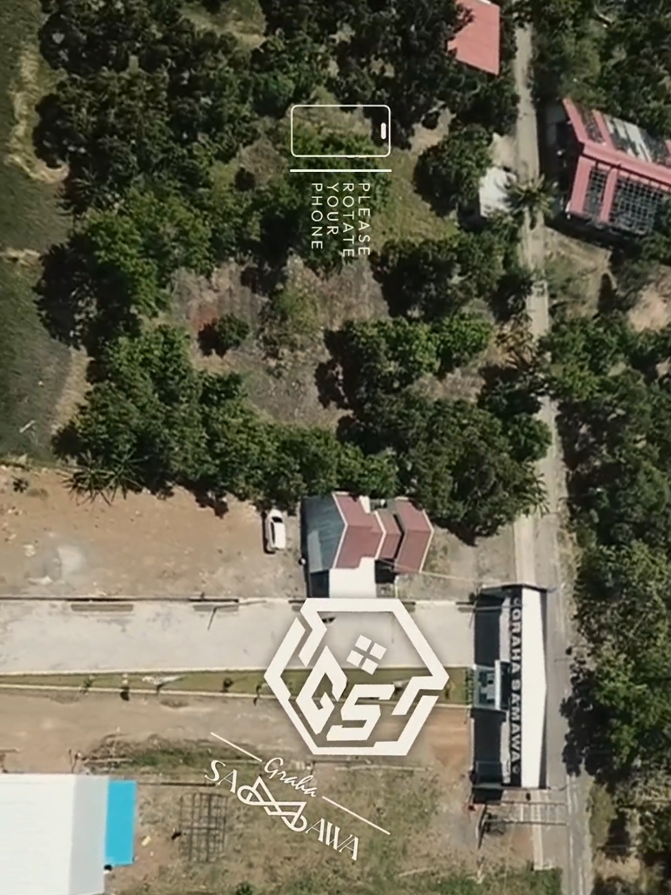 Panorama Kawasan Perumahan Subsidi Graha Samawa dari Langit.  Terlihat jelas kawasan hunian modern dengan lingkungan asri, jalan lebar, dan fasilitas lengkap.  #dronevideo #GrahaSamawa #RumahSubsidi #pasuruanhits  #fyp