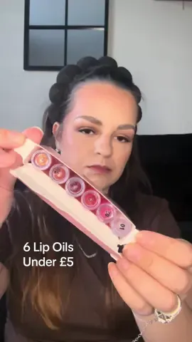 ✨ 6 mini lip oils for under £5?! 👀 Perfect stocking filler vibes 🎄💋 #christmasgiftideas #stockingfillers #giftideas #lipoils #tiktokmademebuyit 