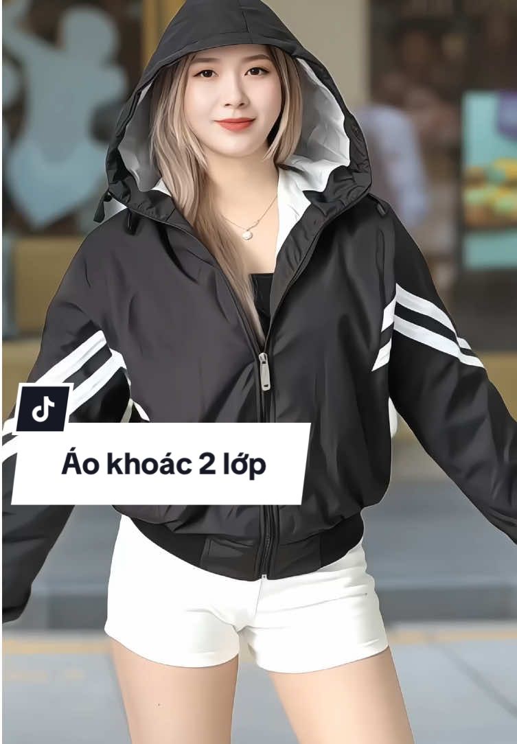 Áo khoác nữ form cánh dơi, chất liệu vải dù 2 lớp, giúp chống nắng và chống gió hiệu quả. Thiết kế trẻ trung, năng động với form dáng rộng thoải mái, phù hợp với xu hướng thời trang hiện tại. Nón to và túi trong rộng, dễ dàng chứa đựng #aokhoac2lop #aogioformcanhdoi #aokhoacnu #aonu #xuhuong 