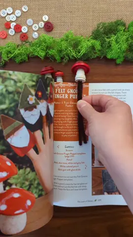 Button Mushroom Bookmarks 🍄 The perfect thing to keep your place while crafting with The Big Book of Fantasy Kid Crafts! To make these bookmarks, fold a pipe cleaner in half and thread on 4 red buttons starting with the smallest button and ending with the largest. Then, thread on smaller white buttons as the base of the mushroom. Leave the remaining pipe cleaner to place inside your book and have a little mushroom garden coming out from the pages! #kidcrafts #easycrafts #fallcrafts 