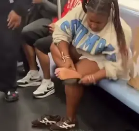 A video of a woman scrubbing her feet inside a crowded New York City subway has sparked widespread outrage on social media. Calmly seated on the train, the woman was seen exfoliating her feet as fellow passengers looked on in shock and disbelief. The clip, recorded by one of the commuters, quickly went viral with many viewers demanding strict action against her for inappropriate behaviour in public transport. [New York City subway, woman scrubbing feet] #trend #foryoupage #followersシ゚ #foryouシ #newyork 