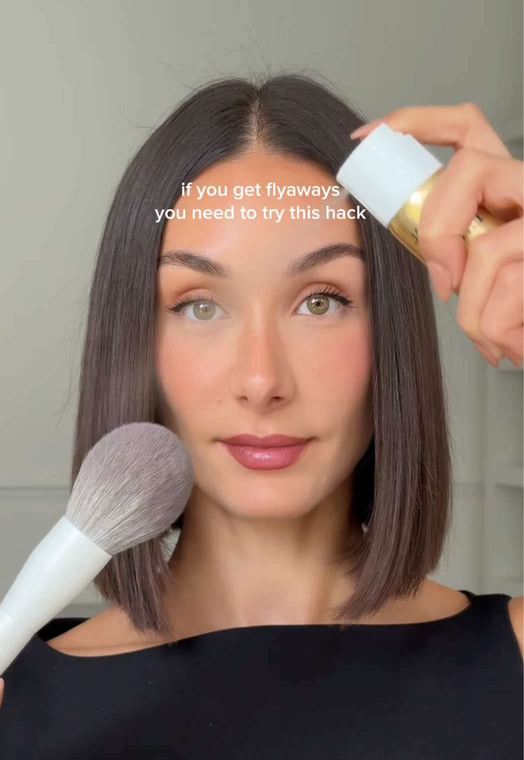 If you want to tame your flyaways then you need try this quick and easy hair hack - it’s a gamechanger ✨  Products: @L'Oréal Paris UK Elnett hairspray @Morphe Cosmetics brush #hair #hairhack #hairtok #hairtutorial #hairstyle 