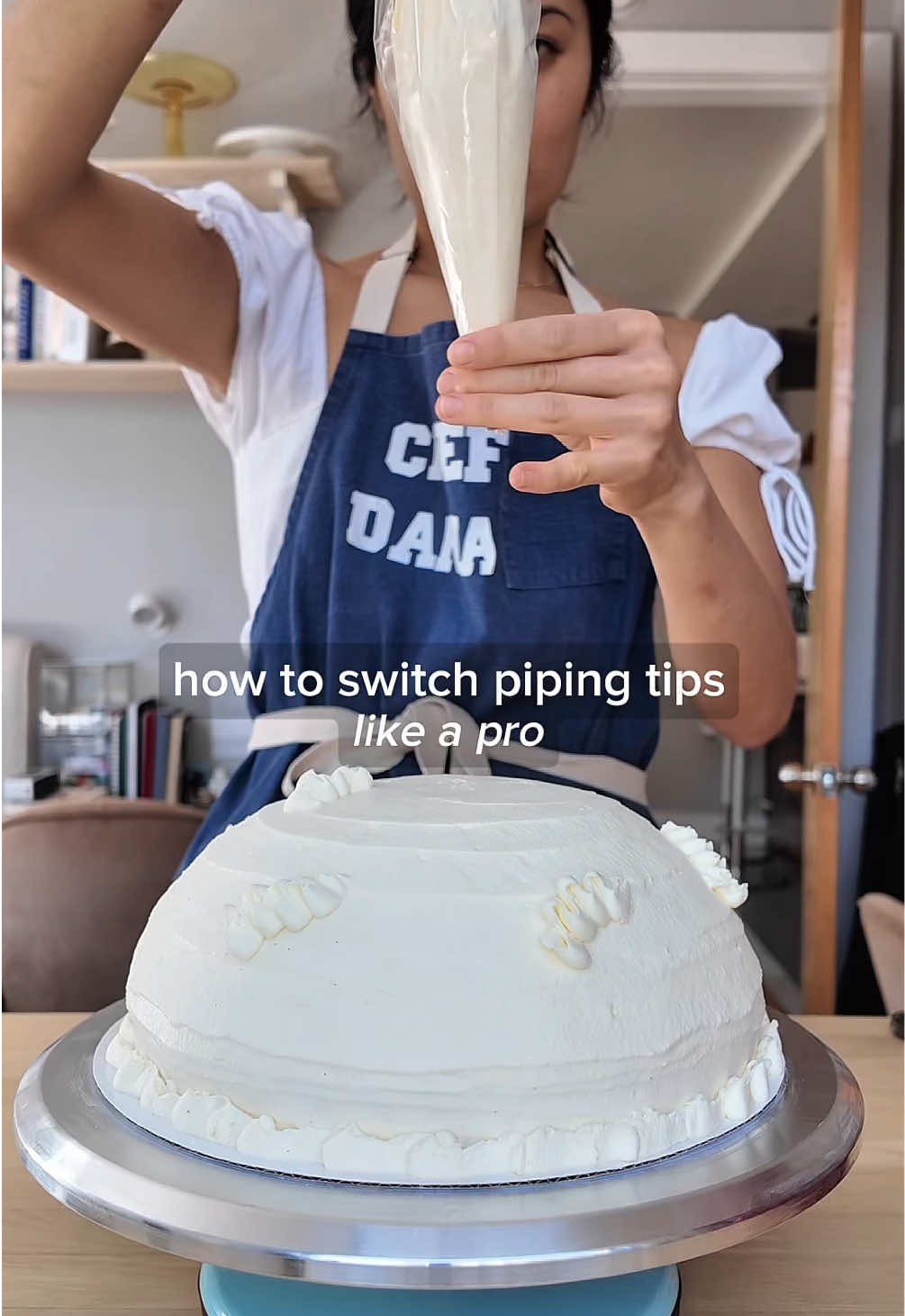 how to switch piping tips without a coupler my first time trying this at home after doing it at the restaurant (just completed my first month 😄🎉) steps:  1. prepare piping bags fitted with desired piping tips  2. fill a tipless piping bag with frosting (the mother bag) 3. insert filled mother bag into piping bag with tip 4. apply pressure and pipe as necessary  5. to switch tips, remove mother bag 6. insert mother bag into other fitted piping bags (or recycle the same piping bag by removing/replacing the tip)  now you can easily switch between several piping tips for your decorating needs!  come back to see how i finished this cake 😌 #piping #pipingskills #cakedecorating #pipingtips 