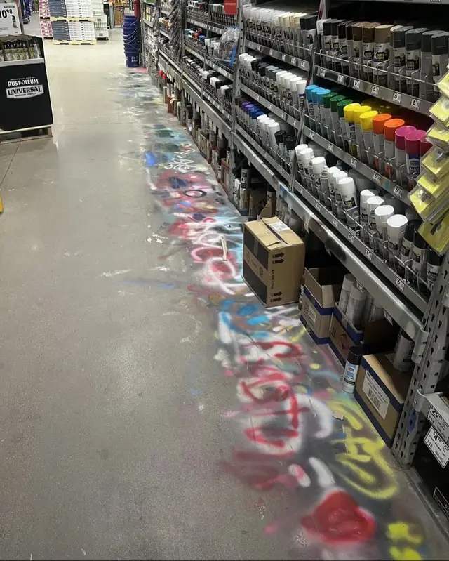 the “spray paint test” is a phenomenon where people test spray paint onto a surface (sometimes the ground) before purchasing. these spontaneous swatches are meant to confirm the color or consistency, but they leave behind layers of overlapping marks that build up over time.