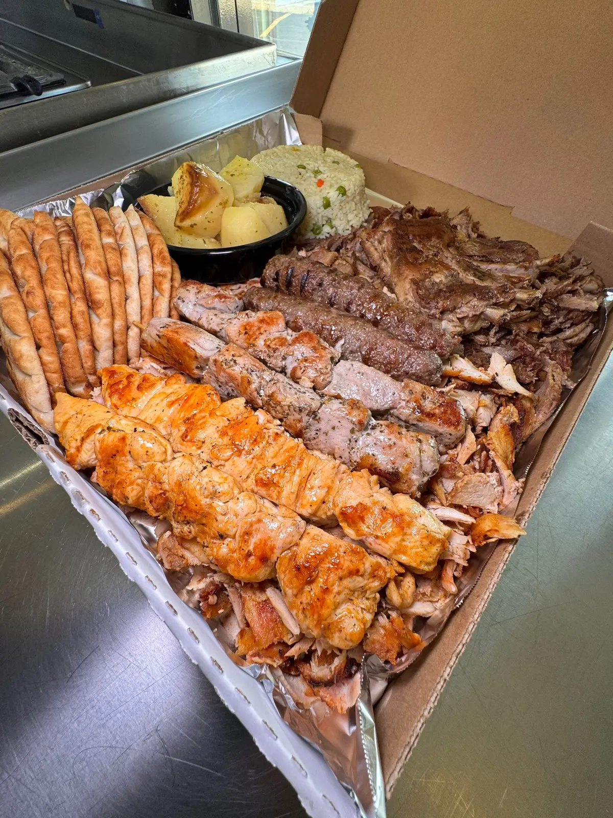 Stopped at Grilliant Greek Gyro & Grill (655 Welsh Rd, Maple Glen, PA) and it blew me away. The gyro is legit — fresh pork and chicken, no frozen stuff. Had to try the Mixed Meat Box for six and it came loaded with everything: gyro, souvlaki, tenderloin, pita, tzatziki, you name it. Not only is the food excellent, but the place is spotless inside and the people are extremely friendly. Hard to beat that combo. Pictures tonight… video drops tomorrow 👀🔥 #Grilliant #MapleGlenEats #GreekFood #GyroTime #MixedGrill     