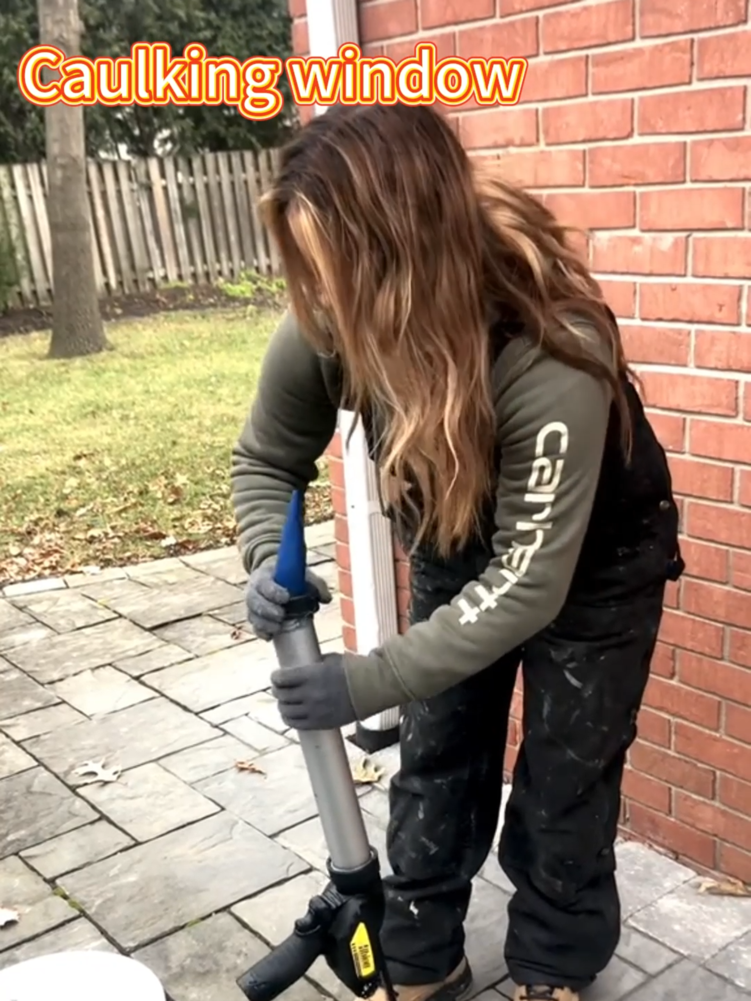 Girl caulking window.#caulking #sealant #structural #homeimprovement #silicone #goodjob #girl