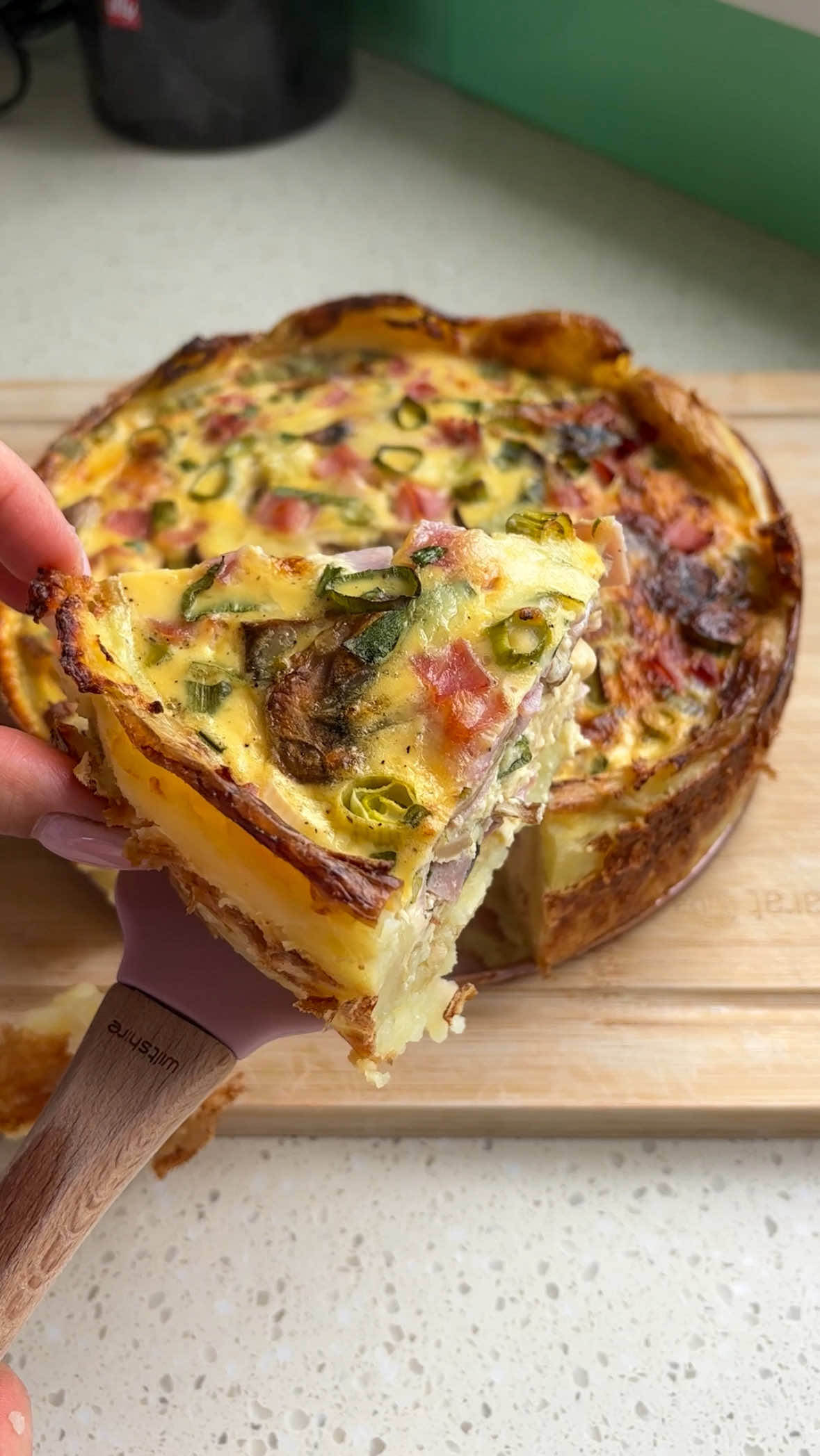 Ham, mushroom and cheese potato quiche One thing I hate 👉🏼 waste. So here is my ham, mushroom and cheese quiche using potatoes as the base. This is such a good swap for the classic so save this recipe and give it a go! Ingredients 4 large potatoes, boiled until cut in half 6 eggs 3/4 cup milk 1/2 cup greek yoghurt 1 cup cheese, grated 3 spring onions 3 large button mushrooms, cooked in olive oil on hight heat. 150g good quality ham (or bacon)   Boil the potatoes until fork tender. Meanwhile, heat a drizzle of olive oil in a large pan on high heat. Slice and cook the mushrooms until browned, then set aside to cool. Once the potatoes are softened, place into a cake or quiche tin and use the bottom of a glass to squish them into the base. Spray generously with olive oil and bake in the oven for 30 minutes or until browned and crispy. Set aside to cool slightly. In a large bowl, combine the eggs, milk, yoghurt and whisk well. Add the sliced spring onions, grated cheese, cooked mushrooms, sliced ham (reserving some for on top) and mix until combined. Season with salt and pepper.  Pour the egg mixture into the tin. Top with remaining ingredients and place back in the oven for 45-50 minutes or until set (this will depend on how deep your cake tin is so keep checking). Allow to cool slightly before slicing and serving. #quiche #nofoodwaste #eggs #australianeggs #quicherecipe         @Australian Eggs 