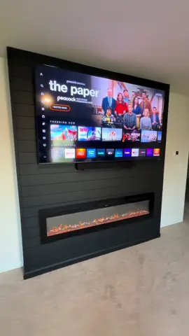 Sleek, sophisticated, and unforgettable. this fireplace is the statement piece every home deserves.  #ForYouPage#FYP#ViralHome#TikTokHomes#tiktokmademedoit