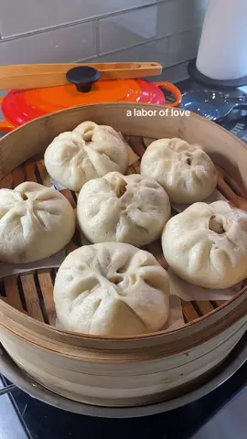 baozi dough 1 1/2 tsp yeast 2 tsp sugar 1 1/2 cup lukewarm water 4 1/2 cup flour mix yeast, sugar, water together. add flour in 1/2 cup at a time. use a mixer with a dough hook if you have it but i just use my hands. knead for 15 min. dough should be soft and my mom always said to make sure it's 1) as soft as an earlobe 2) that we've kneaded the bowl clean and there's nothing sticking to the bowl. form into a ball and cover bowl with lid or plastic wrap and set it in a warm place for about an hour. take that time to make the filling.  baozi filling 1 1/2 lb ground pork 2 tbsp water 2 tbsp vegetable oil (i infuse mine with scallions and ginger or sometimes i use bacon fat here) 2 tbsp minced ginger 1/2 cup shiitake mushroom, chopped 1/2 cup onion, chopped 1/4 cup scallions, chopped 2 tbsp shaoxing wine 1 tbsp soy sauce 1 tbsp sweet bean sauce 2 tbsp ground bean sauce 1 tbsp oyster sauce  dash sugar, white pepper, sesame oil mix everything together.  how to assemble and steam: cut and portion dough into 24 pieces. roll into a disc leaving the middle thicker and the edges thinner to ensure you don't bite into a mound of dough at the top. for right handed people: put disc on left hand, add scoop of filling to center with your right hand. use your right hand to fold the disc into a bun. make sure to pinch the folds together. if you're lazy, skip the pleats and pinch the disc together and lay it seam side down. repeat until you're out of dough and let them proof for 15 min in the steamer. if you have leftover filling, fry it up and eat over rice.  once the baozi look puffy, time to steam. set steamer on top of pot filled with cold water. turn heat up to boil and let this go for 15 min. after 15 min, turn off the heat but keep the lid on another 5 minutes so the buns don't collapse.  #creatorsearchinsights #food #fyp 