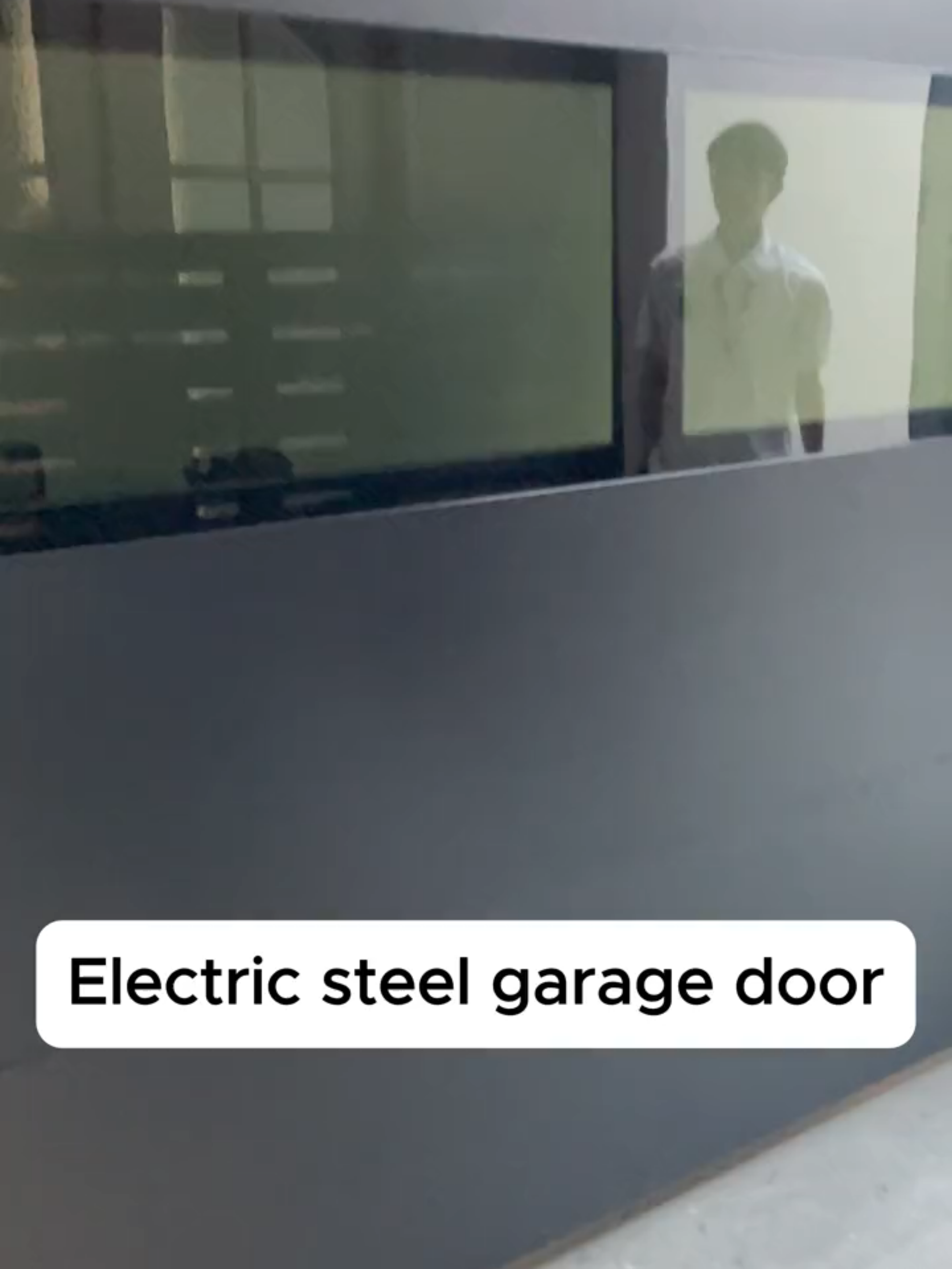 Modern steel electric garage door #door #fyp #AluminiumDoors #SmartHome #HomeRenovation #HomeBuildingMaterials #tiktok #garag #Security #villa #Residential #custom #business #wholesale