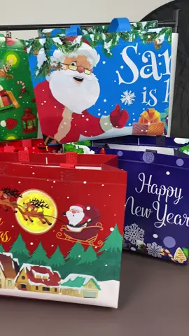 Don’t waste time with wrapping paper! Save money and time with these Christmas Bags!#christmasbags #reusablegiftbags #tiktokshop 