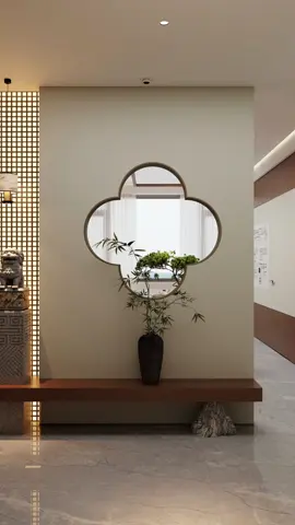 Vách ngăn phong cách Tống cho sảnh vào nhà/không gian trà/thư phòng 	•	Lưới gỗ phát sáng + Cột buộc ngựa + Cửa sổ hoa mai: Đặt đối diện cửa chính, làm vách ngăn phân tách không gian sảnh vào với phòng khách. 	•	Bên trái: Lưới gỗ thoáng có ánh sáng hắt, phía dưới đặt cột buộc ngựa. 	•	Bên phải: Mở cửa sổ tròn hoa mai, bên trong đặt vách ngăn xen kẽ cùng cột trang trí, bày tre Quan Âm. 	•	Góc chuyển: Ốp gỗ + vải dán tường làm điểm nhấn trang trí. #nhansinhtradao #nộithấtphòngtrà #khonggiantradao #nộithấtcổphong #setupkhonggianphongtra 