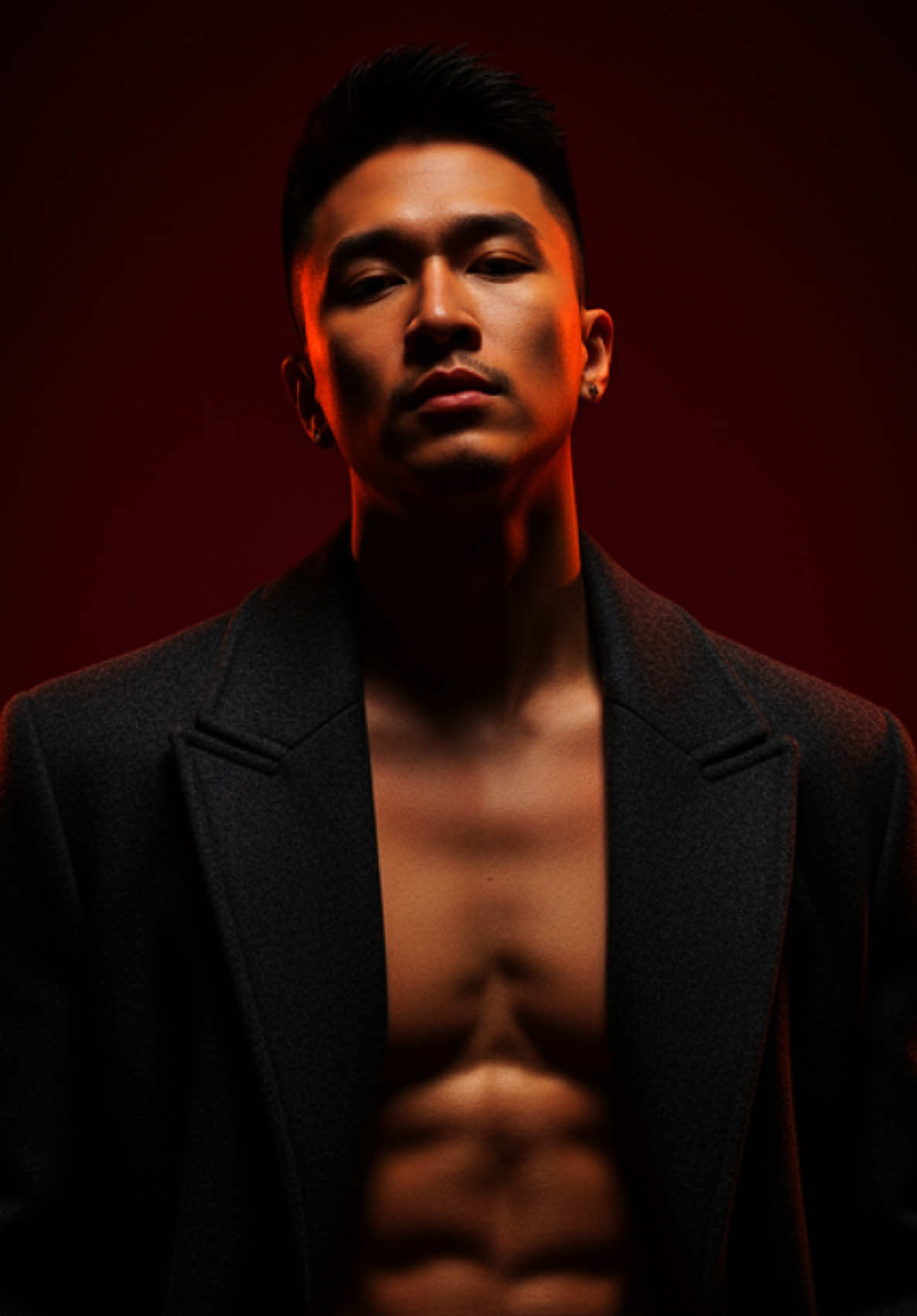 Step 1: Go to Gemini Al Step 2: Upload your photos Step 3: Copy and Paste this prompt A hyperrealistic vertical portrait shot in 1080×1920 format, characterized by stark cinematic lighting and intense contrast. Captured with a slightly low, upward-facing angle that dramatizes the subject's jawline and neck, the composition evokes quiet dominance and sculptural elegance. The background is a deep, saturated crimson red, creating a bold visual clash with the model's luminous skin and dark wardrobe. Lighting is tightly directional, casting warm golden highlights on one side of the face while plunging the other into velvety shadow, emphasizing bone structure with almost architectural precision. The subject's expression is unreadable and cool-toned-eyes half-lidded, lips relaxed- suggesting detachment or quiet defiance. The model wears a heavy wool or felt overcoat, its texture richly defined against the skin's smooth, dewy glow. Minimal retouching preserves skin texture and slight imperfections, adding realism. Editorial tension is created through close cropping, tonal control, and the almost oppressive intimacy of the camera's proximity. There are no props or accessories; the visual impact is created purely through light, shadow, color saturation, and posture - evoking high fashion, contemporary isolation, and hyper-modern masculinity.#chatgpt #CapCut #gemini #ai 
