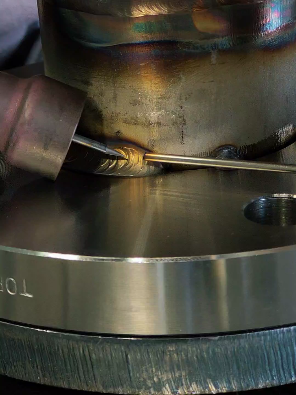 Welding stainless pipe to flange, 125A TIG, filler rod 316L Ø2.4mm ⚡️ #BadWelderMaster #TIGwelding #stainlesssteel #weldlife #creatorsearchinsights  @Master from Novikov Jewelry 