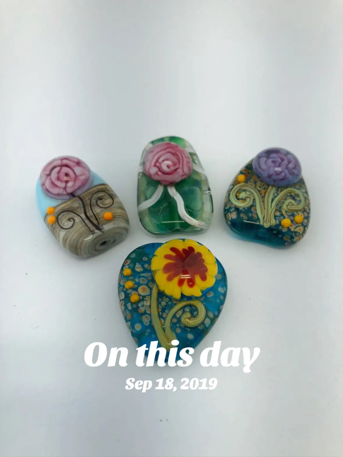 Here are some of my glass flowers with their inspiration 💜 #glass #glassbeads #jelvehdesigns #lampworking #glassblowing