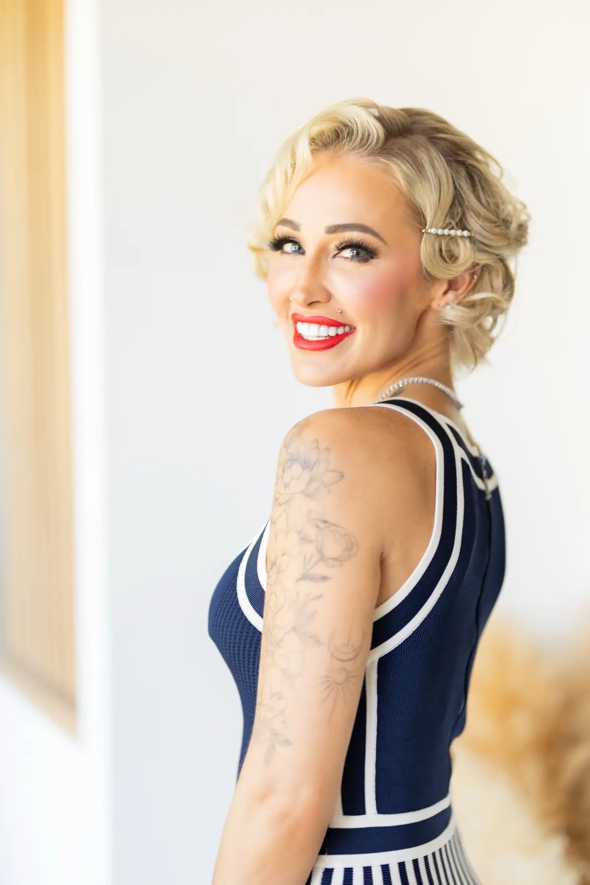 Getting glammed by my girl Nadia for a killer retro vibe photoshoot. No one does retro glam looks better than her!! God I love playing dress up, especially in 50’s vibes! 😍 💄 Makeup artistry insights: @Nadia  📸 Glam photos: @goldengloweddings  💍 Jewelry: @TACORI  👗 Dress details: @Marciano  🌟 Style inspiration: 1950’s retro 