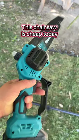 Mini Chainsaw – Compact cordless saw for pruning, trimming, and light cutting tasks. #minichainsaw #chainsaw #gardentools #outdoorgear #DIYprojects #woodworking #tools #yardwork