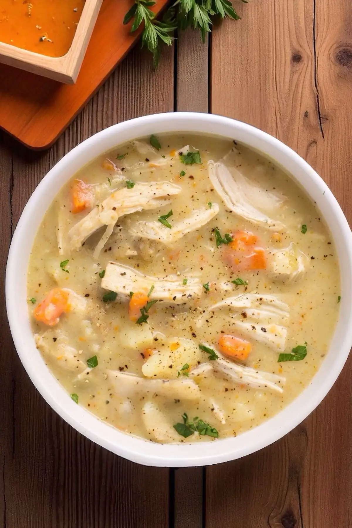 🥔🍗 Craving something warm and cozy? This Potato Soup with Chicken and Carrots 🥕✨ is creamy, hearty, and made with simple ingredients you already have at home. Perfect for family dinners or chilly nights! 😋💛 ✨ Serve hot with bread or rice for a filling meal! 👉 Who’s craving a warm bowl of this tonight? 🥰 Ingredients:  • 2 tbsp olive oil or butter  • 1 medium onion, chopped  • 3 garlic cloves, minced  • 2 medium carrots, diced  • 2–3 medium potatoes, peeled and cubed  • 1 cup cooked chicken (shredded or diced, breast/thigh)  • 4 cups chicken broth  • 1 cup milk or cream (optional, for creaminess)  • Salt & pepper to taste  • 1 tsp dried thyme or parsley (optional)  • Green onions or parsley for garnish Instructions:  1. Heat oil/butter in a pot. Sauté onion and garlic until fragrant.  2. Add carrots and potatoes, cook for 3–4 minutes.  3. Pour in chicken broth, season with salt, pepper, and thyme. Let simmer until veggies are tender (15–20 mins).  4. Stir in chicken and milk/cream. Simmer another 5 minutes.  5. Adjust seasoning, garnish with green onions or parsley. #PotatoSoup #ChickenSoupRecipe #HealthySoup #ComfortFood #EasySoupRecipe           