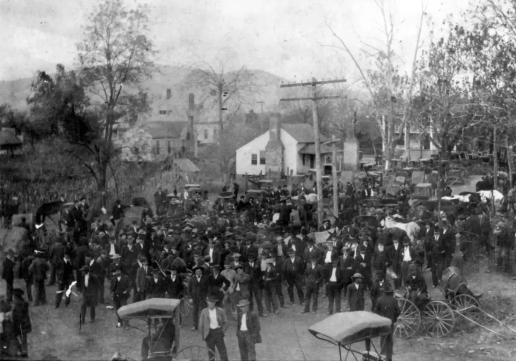 A crowd near the gallows where Ernest Knox and Oscar Daniel were hung, with Sawnee Mountain in the distance, October 25, 1912. Source: Jimmy E. Anderson In September 1912, an 18-year-old White woman’s body was found near the Black community of Oscarville in northeastern Forsyth County, Georgia and five Black suspects were arrested. Rob Edwards was lynched by a mob of Whites; Ernest Knox and Oscar Daniel were tried and found guilty of rape by all-White juries, sentenced to death, then hanged in the Cumming town square in front of 8,000 White people. (The noose was displayed in the county courthouse until 1987.) White men called “Night Riders” began terrorizing Blacks throughout the county, telling them to leave or be killed. Everything the fleeing Black refugees left behind was plundered by Whites who also burned down the abandoned churches. Over several weeks, more than 1,000 Blacks were murdered or run out of Forsyth County. Most Black landowners who were forced to leave couldn’t sell their land before leaving and were never allowed back to sell their land. Consequently, White residents were able to simply take their land titles via adverse possession without having to buy the land. The racial cleansing was so effective, no Blacks would live in the county for the next eighty years. During the Jim Crow era, there were no signs indicating whether a public facility was for “Whites” or “Coloreds” because Blacks were never in the county. In the process of constructing the Buford Dam during the 1950s, the federal government acquired 56,000 acres of land, including Oscarville, forever submerging the formerly vibrant Black town under Lake Lanier, named for a Confederate soldier. On January 17, 1987, Rev Hosea Williams led a civil rights march through Cumming in honor of Rev Martin Luther King, Jr. The fifty marchers were turned back by a mob of thousands of violent Whites who spat and threw rocks while shouting, “Go home, niggers!” Several Whites were arrested for carrying concealed firearms. No descendant of the banished Blacks of Forsyth County has ever received compensation for the land stolen from their ancestors through violence and the legal system. Today, Forsyth County is the wealthiest county in Georgia. Recommended reading: Blood at the Root by Patrick Phillips Thank you.. Black History Snippets @lestercraven… on Substack, for this story.  #fyp #fypシ゚viral #blackhistorytiktok 