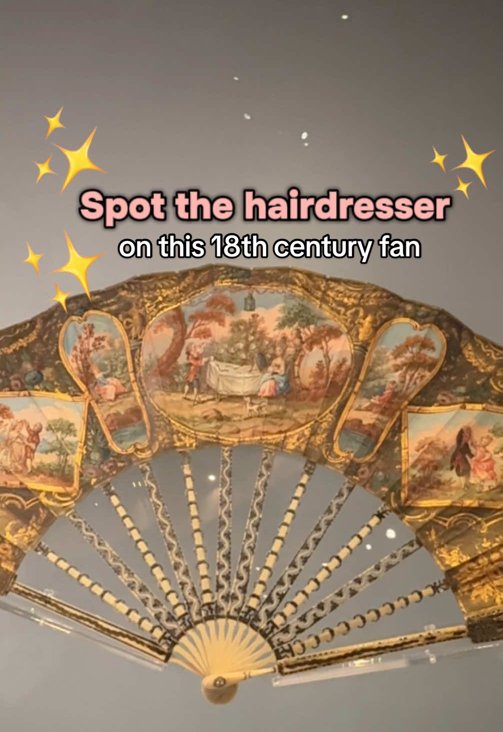 The Madness of the Ladies of Paris, about 1770, unknown maker  This fan from the Marie Antoinette Style exhibition at @V&A Museum shows how integral – and sometimes ridiculed – hairstyles (and the people behind them) were to society at the time.  Here we see a hairdresser up a ladder, styling his client’s towering coiffure, observed by an onlooker with a telescope. #MarieAntoinette #MarieAntoinetteStyle #VintageFan #HairHistory 