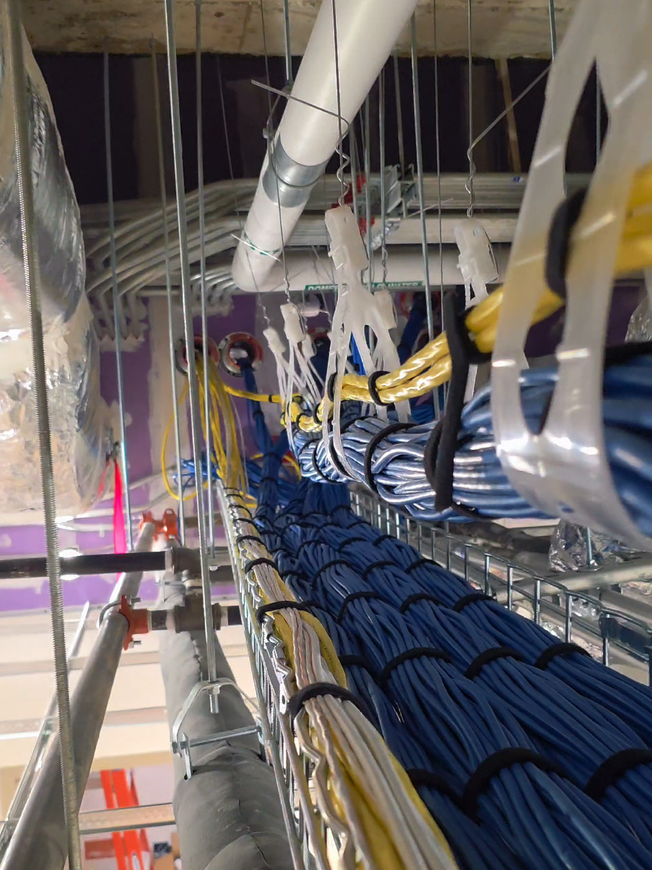 Ever wonder how your computers, phones, and printers get on-line at your office?  This is how. 12miles of cat6a cable pulled on this floor. LV is a small but important part of every project.  That being said, we rely on the electrical contractors conduit install on each project.  A good EC makes a job easy.  A bad one makes it a nightmare.  Every trade plays a part and every trade thinks they're better than all the rest. #office #construction #cat6a #behindthescenes #trades 