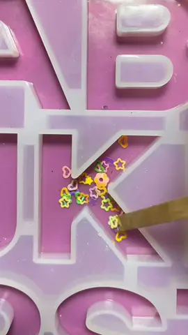 Resin alphabet K with 🌟 #fyp #resin #alphabet #star 