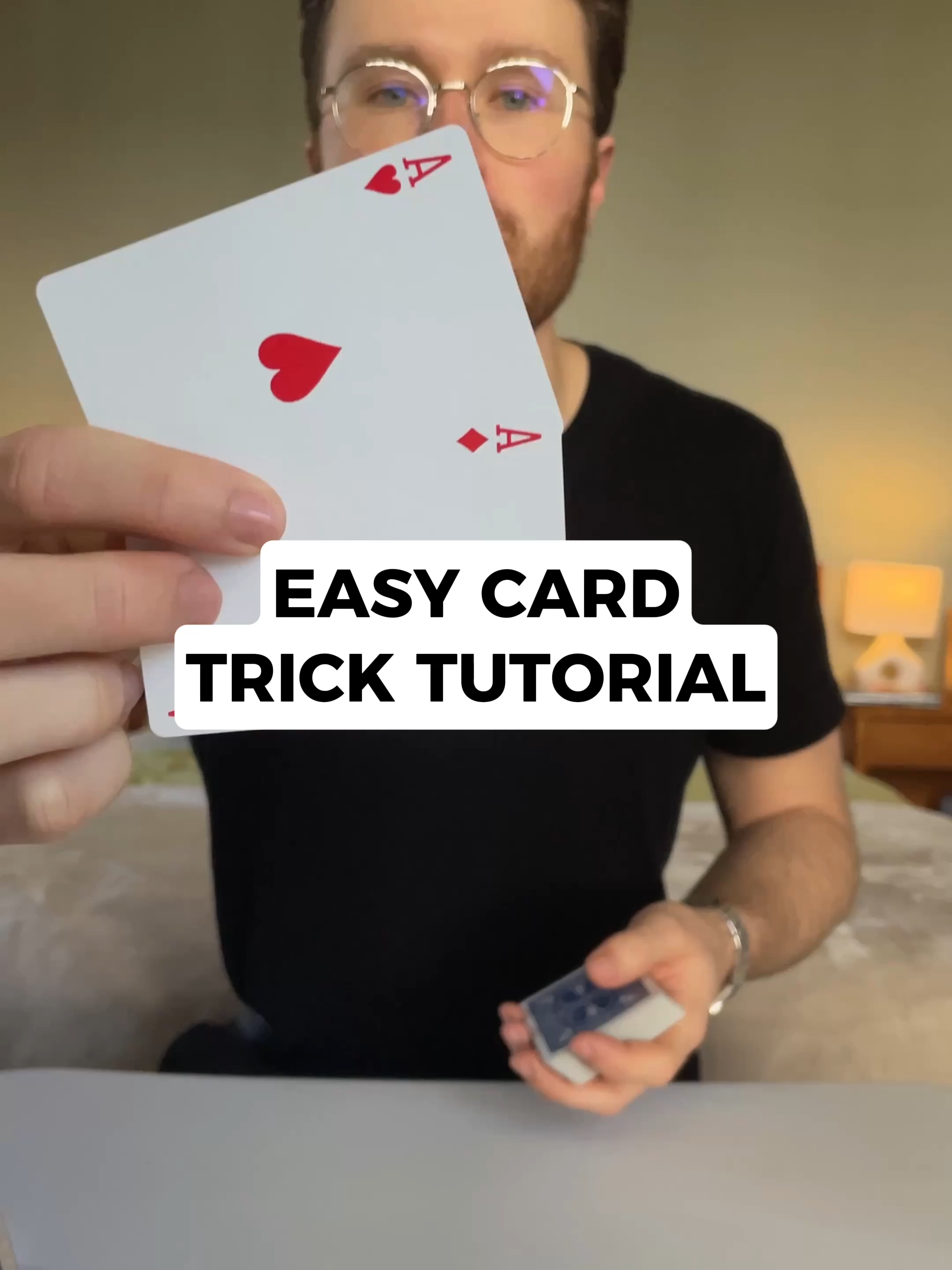 How to do an EASY CARD TRICK for your friends and family!!🃏🎩 This is one of the best self working card tricks in the world. It's extremely powerful and super convincing! This card trick works because when the red ace is placed onto the dealt packet, you place the rest of the deck on top of it. This puts the bottom card of the deck directly next to the red ace. You start with one black ace on the bottom and the other on top. The first red ace will end up next to the black ace that starts on the bottom of the deck, and the second red ace will end up next to the black ace that started on top (this black ace, at the beginning of the trick, was the first card dealt down to the table, which puts it on the bottom for the second round of dealing). #CardMagic #MagicTricks #CardTricksForBeginners #selfworkingcardtrick #MagicTutorial