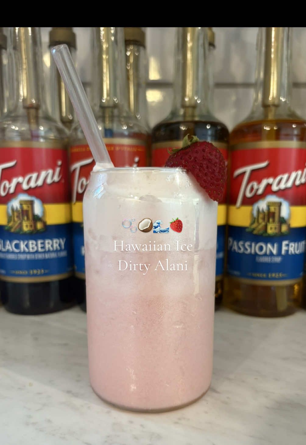 🍓🥥Hawaiian Ice Dirty Alani  _____________________________ Base: -1 tbsp strawberry Purée  -ice -1 pump vanilla bean Torani Syrup -1 pump pineapple Torani Syrup -2 tbsp coconut cream -half a can of Hawaiian Shaved Ice Alani Cold foam: -1/2 pump coconut Torani Syrup -1/2 pump strawberry Torani Syrup  -1 tbsp Heavy whipping cream  Garnish: -Strawberry  #dirtyalaninu #alani #drinkrecipe #toranisyrups #drinkideas    @Alani Nutrition @Torani 