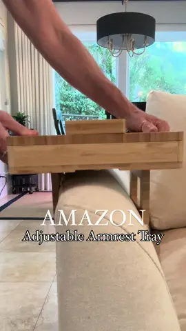 Here is the link - just type into your browser: https://urlgeni.us/amzn/armresttrayadjustpic First armrest tray I’ve found with adjustable legs so it fits your couch no matter what the size! Hidden storage for remotes! Leather mat for finished look and feel. 360 degree rotating phone holder! #amazonhome #homehacks #homesolutions #organizedhome 