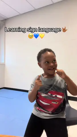 Learning sign language 🤟🏾 #proud #downsyndromeawareness #littlebrownboy #boymomlife #fypシ 💙💛💙💛