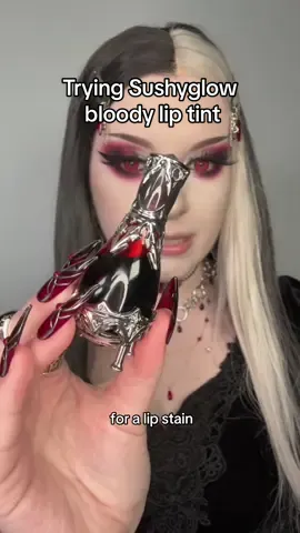 Trying the @sushyglowcosmetics🧚🏻‍♀️🍄 bloody lip tint! I loveeee the new packaging so much it’s perfect tbh . . #lipstain #liptint #sushyglowcosmetics #sushyglow #vampiremakeup #vampirelipstick #vampireaesthetic #gothicmakeup 